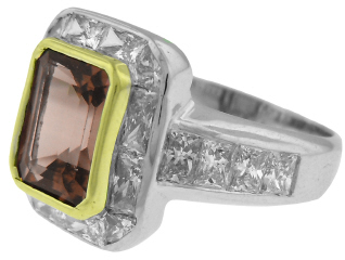 18kt white gold bezel set emerald cut tourmaline and princess cut diamond ring