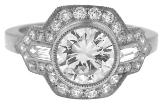 Platinum round and baguette diamond ring