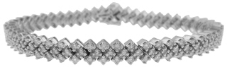14kt white gold  three row saw tooth edge diamond bracelet 7"