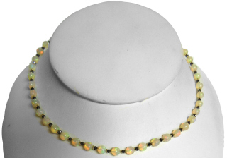 14kt yellow gold 20" opal bead and faceted black diamond bead necklace.