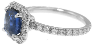 Platinum cushion sapphire and diamond halo ring