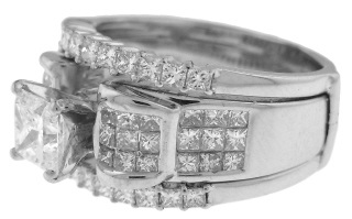 18kt white gold princess cut diamond solitaire with attached 14kt diamond guard