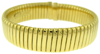 18kt yellow gold flexible cuff bangle bracelet.