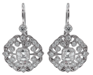 Platinum hanging diamond earrings.