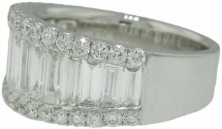 18kt white gold round and baguette diamond ring.