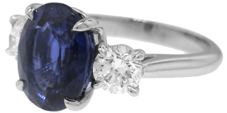 Platinum oval sapphire and round diamond ring