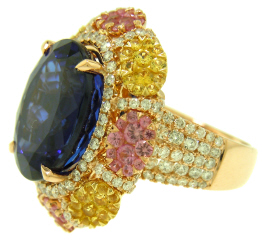 18kt rose gold oval tanzanite, diamond, and yellow and pink sapphire ring