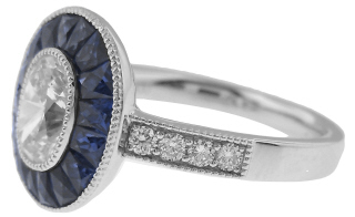 Platinum diamond and sapphire engagement ring with oval diamond 1.01cts E SI2 EGL