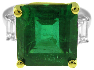 Platinum and 18kt yellow gold emerald cut emerald and diamond ring