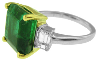 Platinum and 18kt yellow gold emerald cut emerald and diamond ring