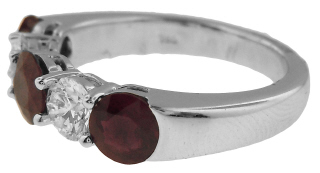 18kt white gold ruby and diamond 5-stone band.