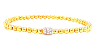 18kt yellow gold bangle bracelet with one pave diamond station