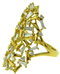 18kt yellow gold round and baguette diamond fashion ring.