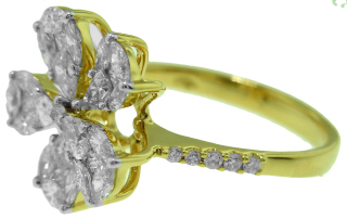 18kt yellow gold diamond flower ring.