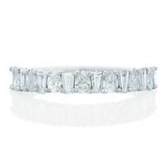 18kt white gold tapered baguette and pear shape diamond band.