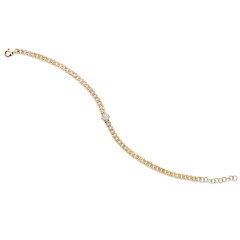 14kt yellow gold curb link bracelet with bezel set pear shape diamond.