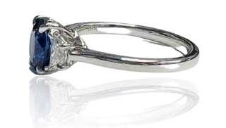 18kt white gold oval sapphire and half moon diamond ring