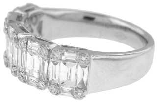 18kt white gold round and baguette diamond ring.