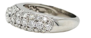 Platinum bezel set oval and pave set diamond ring