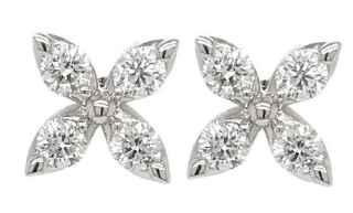 14kt white gold diamond flower style stud earrings.