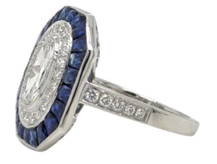 Platinum oval, round diamonds and sapphire ring