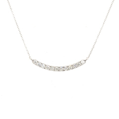 14kt white gold curved bar diamond necklace.