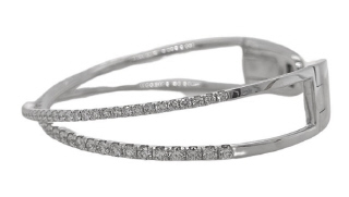 18kt white gold diamond cross over cuff style bangle bracelet.