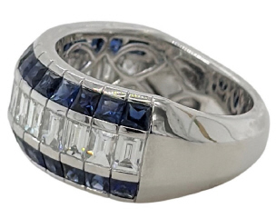 18kt white gold 3-row channel set sapphire and diamond band.