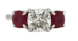 Lab Grown: 18kt white gold 3-stone ruby and lab grown diamond ring.