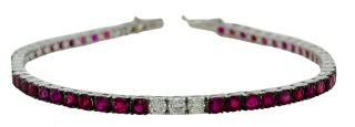 18kt white gold ruby and diamond tennis bracelet.