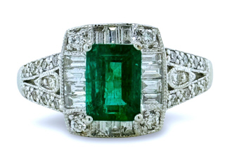 18kt white gold emerald, round and baguette diamond ring