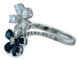 18kt white gold sapphire and diamond bypass flower ring