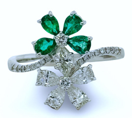 18kt white gold emerald and diamond bypass flower ring
