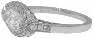 Platinum marquise diamond and pave set diamond ring