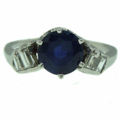 Platinum sapphire and baguette diamond ring