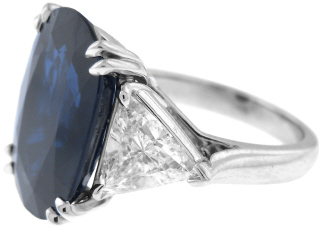 Platinum oval sapphire and trillion pair diamond ring