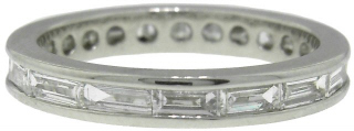 Platinum channel set baguette diamond eternity band