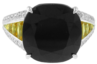 Platinum ring with cushion sapphire, diamonds, and yellow sapphires