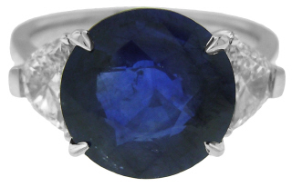 Platinum round sapphire and half moon diamond pair ring