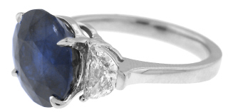 Platinum round sapphire and half moon diamond pair ring