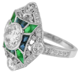 Platinum diamond ring with french cut sapphires and emeralds.