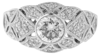 18kt white gold antique style ring with bezel set center round diamond