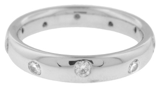 14kt white gold band with flush set round diamonds