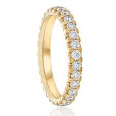 18kt yellow gold shared prong diamond eternity band.