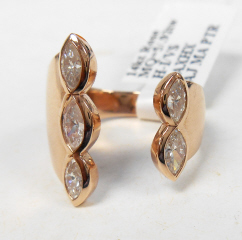 14kt rose gold marquise diamond ring.