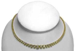 14kt yellow gold 4-prong diamond riviera necklace.