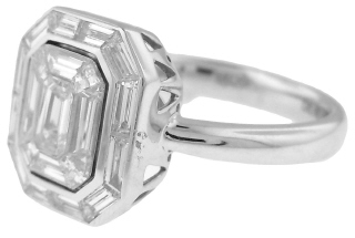 18kt white gold emerald cut and baguette diamond illusion ring.