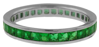 Platinum channel set square emerald eternity band