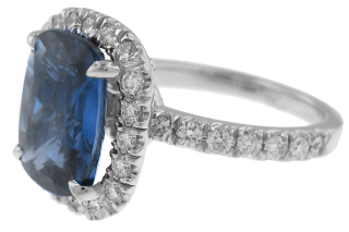 Platinum cushion cut sapphire and diamond ring.