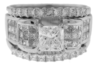 18kt white gold princess cut diamond solitaire with attached 14kt diamond guard